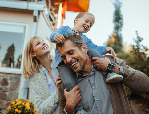 a family playing outside